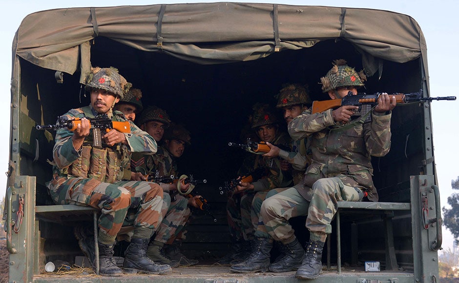 Indian army personnel sit in the rear of a truck in Pathankot on Sunday. Seven security personnel were killed in an attack on army base in Pathankot. AFP Indian army personnel sit in the rear of a truck in Pathankot on Sunday. Seven security personnel were killed in an attack on army base in Pathankot. AFP