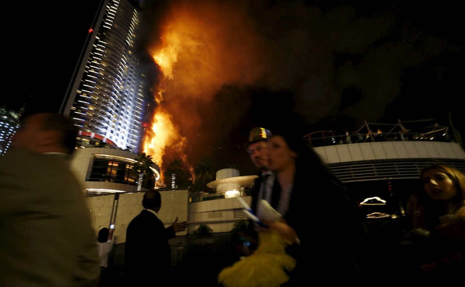 The Address Downtown hotel, which is a few blocks from the iconic Burj Khalifa, the world's tallest tower, was engulfed in flames across several floors as sirens wailed and helicopters hovered overhead. Reuters The Address Downtown hotel, which is a few blocks from the iconic Burj Khalifa, the world's tallest tower, was engulfed in flames across several floors as sirens wailed and helicopters hovered overhead. Reuters