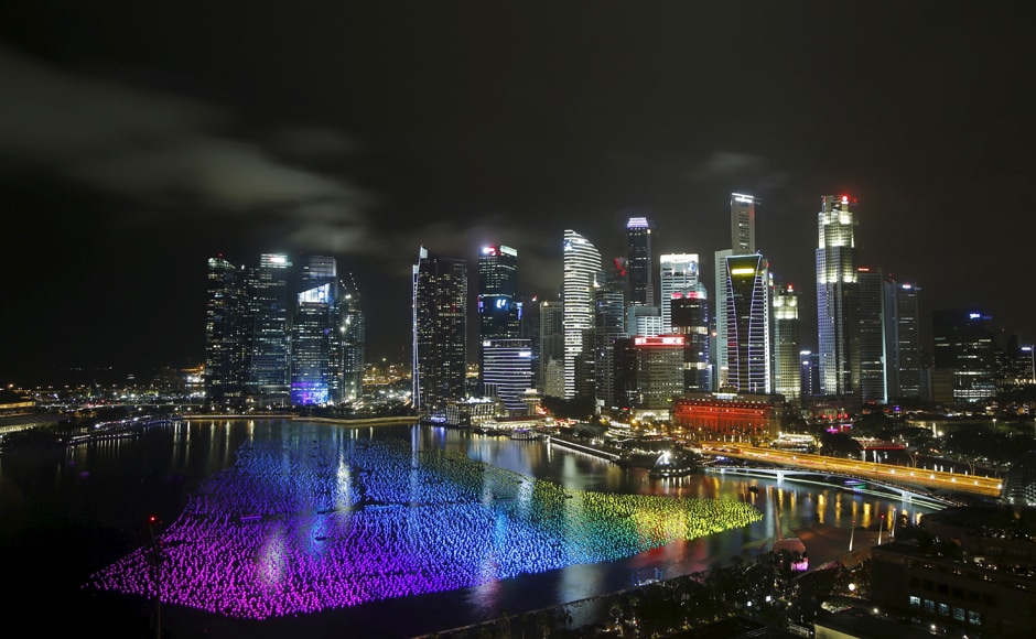 Thousands of floating "wishing spheres" carrying people's New Year wishes line the Marina Bay against the skyline of Singapore. Reuters Thousands of floating "wishing spheres" carrying people's New Year wishes line the Marina Bay against the skyline of Singapore. Reuters