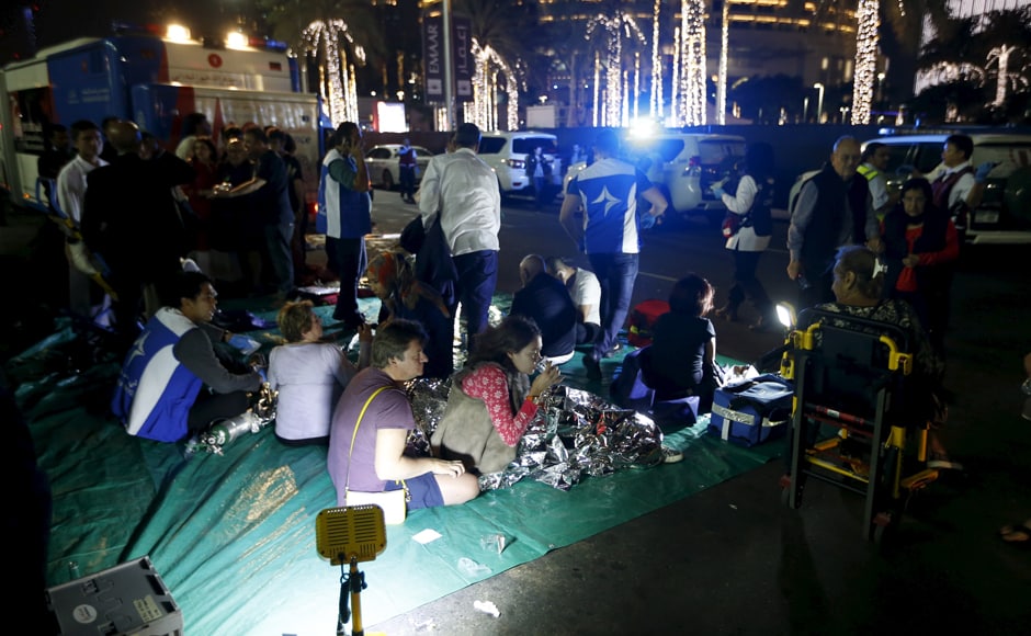 Wounded people are seen outside the Address hotel and residential block in Dubai. Reuters Wounded people are seen outside the Address hotel and residential block in Dubai. Reuters