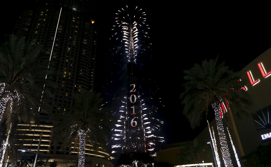 Fireworks explode over Dubai's Burj Khalifa, the tallest building in the world, during the New Year celebrations. Meanwhile the Address Downtown Dubai hotel, which had been engulfed by a fire, can be seen on the left. Reuters Fireworks explode over Dubai's Burj Khalifa, the tallest building in the world, during the New Year celebrations. Meanwhile the Address Downtown Dubai hotel, which had been engulfed by a fire, can be seen on the left. Reuters