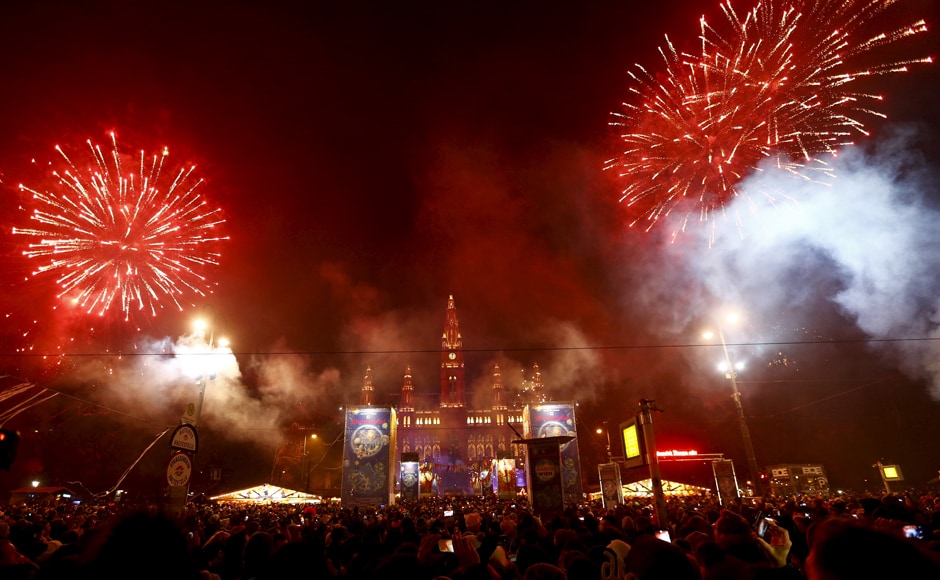A massive firework display is seen in the crowded sqaure in front of Vienna's city hall in Austria. Reuters A massive firework display is seen in the crowded sqaure in front of Vienna's city hall in Austria. Reuters