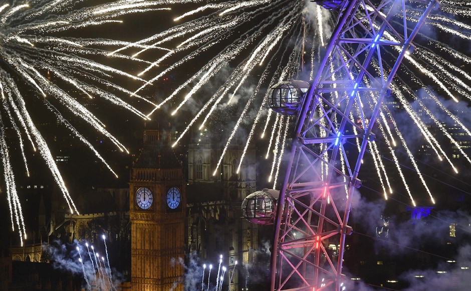 Firworks over London Eye and the Big Ben mark the beginning of the New Year in London. Reuters Firworks over London Eye and the Big Ben mark the beginning of the New Year in London. Reuters