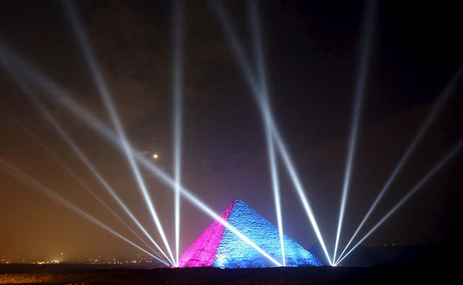 Egyptians celebrate in front of great pyramids during New Year's day celebrations in Cairo. Reuters Egyptians celebrate in front of great pyramids during New Year's day celebrations in Cairo. Reuters
