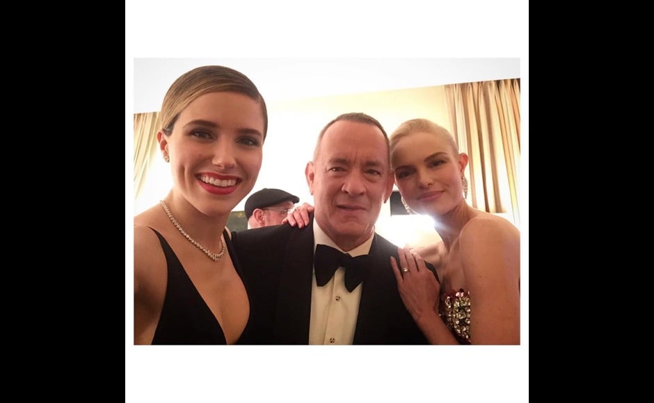 "I must #mcm Tom Hanks today. This lovely man pep-talked my #ppc -- presenting-partner-in-crime -- @katebosworth and I backstage last night, and helped us calm our nerves before we took the stage. Then she and I held hands as we waited in the wings, and hey we made it! #NobodyTripped #LadyLove #GirlCrushSinceBlueCrush #AndYesLightAlwaysShinesOutOfHerFace #ActuallyAllOfTheTime #ShesBornWithIt #GoldenGlobes," Sophia Bush said on this photo. Image courtesy: @sophiabush/Instagram "I must #mcm Tom Hanks today. This lovely man pep-talked my #ppc -- presenting-partner-in-crime -- @katebosworth and I backstage last night, and helped us calm our nerves before we took the stage. Then she and I held hands as we waited in the wings, and hey we made it! #NobodyTripped #LadyLove #GirlCrushSinceBlueCrush #AndYesLightAlwaysShinesOutOfHerFace #ActuallyAllOfTheTime #ShesBornWithIt #GoldenGlobes," Sophia Bush said on this photo. Image courtesy: @sophiabush/Instagram