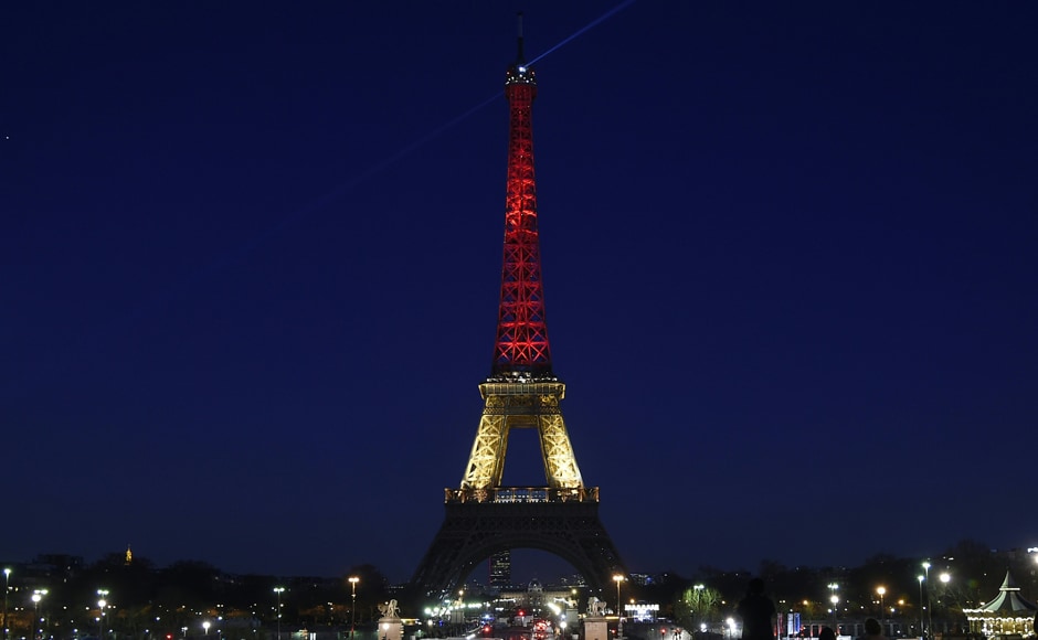 The Eiffel Tower in Paris was illuminated in colours of the Belgian flag in tribute to the victims of terrorist attacks in Brussels. AFP The Eiffel Tower in Paris was illuminated in colours of the Belgian flag in tribute to the victims of terrorist attacks in Brussels. AFP