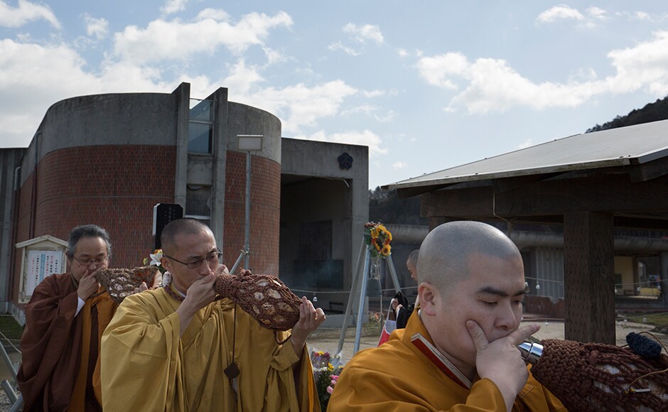 Buddhist monks offer prayers in front of the memorial at Okawa Elementary School in Ishinomaki, Japan on Friday. Overall 470,000 people were evacuated from the area around Fukushima as the scale of the radiation threat became clear. Getty Images Buddhist monks offer prayers in front of the memorial at Okawa Elementary School in Ishinomaki, Japan on Friday. Overall 470,000 people were evacuated from the area around Fukushima as the scale of the radiation threat became clear. Getty Images