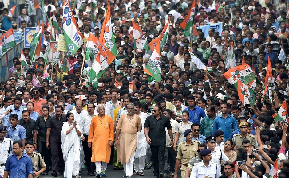 West Bengal Chief Minister and TMC Supremo Mamata Banerjee with party leaders and supporters at an election campaign rally in support of party candidates in Kolkata on Thursday. PTI West Bengal Chief Minister and TMC Supremo Mamata Banerjee with party leaders and supporters at an election campaign rally in support of party candidates in Kolkata on Thursday. PTI