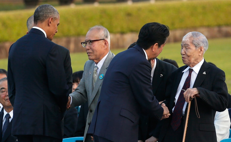 Barack Obama, second from left, greets Shigeaki Mori, an atomic bomb survivor, third from right, and Sunao Tsuboi, right, chairman of Japan Confederation of A-and H-Bomb Sufferers Organizations at the event. AP Barack Obama, second from left, greets Shigeaki Mori, an atomic bomb survivor, third from right, and Sunao Tsuboi, right, chairman of Japan Confederation of A-and H-Bomb Sufferers Organizations at the event. AP