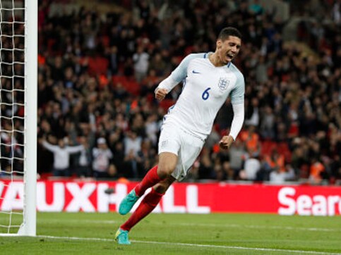 Chris Smalling helps England edge past 10-man Portugal at Wembley Chris Smalling helps England edge past 10-man Portugal at Wembley
