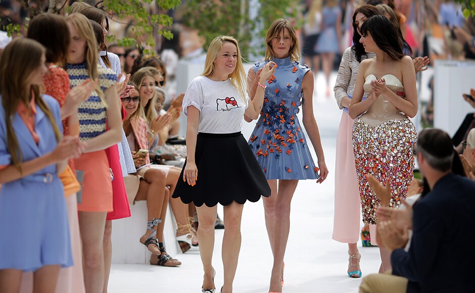 Designer Marina Hoermanseder, center left, receives the applause after her 2017 spring/summer fashion show during the Mercedes Benz Fashion Week in Berlin, Thursday, June 30, 2016. (AP Photo/Markus Schreiber) Designer Marina Hoermanseder, center left, receives the applause after her 2017 spring/summer fashion show during the Mercedes Benz Fashion Week in Berlin, Thursday, June 30, 2016. (AP Photo/Markus Schreiber)