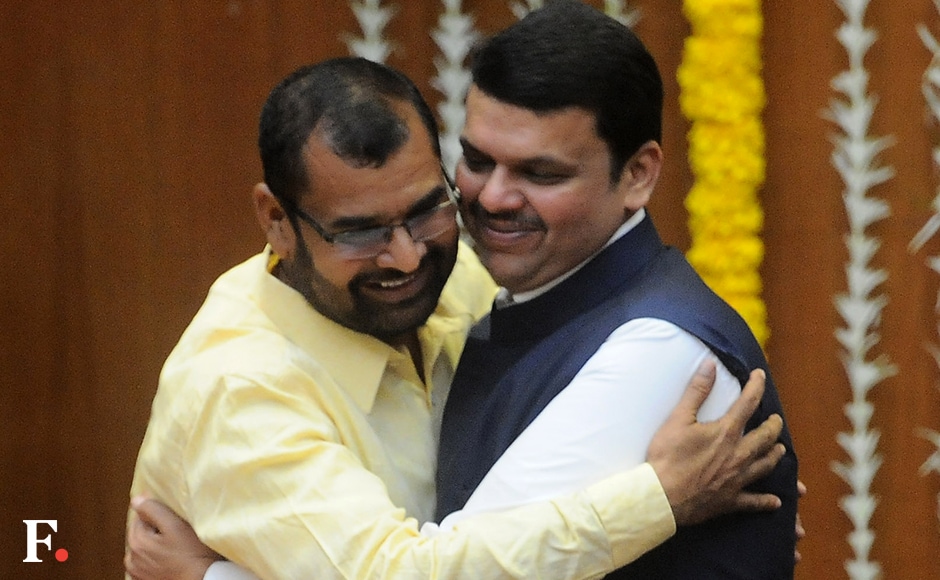 Sadabhau Khot is congratulated by CM Fadnavis after being inducted as minister of state. Khot belongs to the Shetkari Swabhiman Party. Sachin Gokhale/Firstpost Sadabhau Khot is congratulated by CM Fadnavis after being inducted as minister of state. Khot belongs to the Shetkari Swabhiman Party. Sachin Gokhale/Firstpost