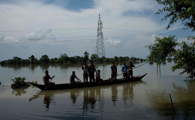 Forest officials on a boat head to rescue a baby rhino. The six baby rhinos who were rescued are between the ages of one month and one year. AP Forest officials on a boat head to rescue a baby rhino. The six baby rhinos who were rescued are between the ages of one month and one year. AP