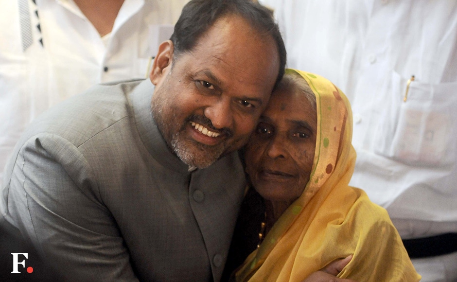 Cabinet Minister Mahadeo Jankar poses with his mother Sonabai, 91, after the oath taking ceremony. Sachin Gokhale/Firstpost Cabinet Minister Mahadeo Jankar poses with his mother Sonabai, 91, after the oath taking ceremony. Sachin Gokhale/Firstpost