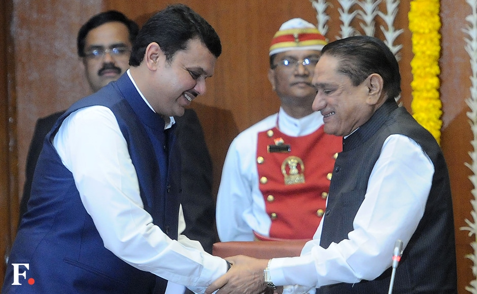 Pandurang Phundkar greets Maharashtra Chief Minister Devendra Fadnavis after taking oath as cabinet minister. He is a very senior leader close to the late Gopinath Munde and has previously occupied positions such as BJP state party president and Opposition leader in the legislative council. Sachin Gokhale/Firstpost Pandurang Phundkar greets Maharashtra Chief Minister Devendra Fadnavis after taking oath as cabinet minister. He is a very senior leader close to the late Gopinath Munde and has previously occupied positions such as BJP state party president and Opposition leader in the legislative council. Sachin Gokhale/Firstpost