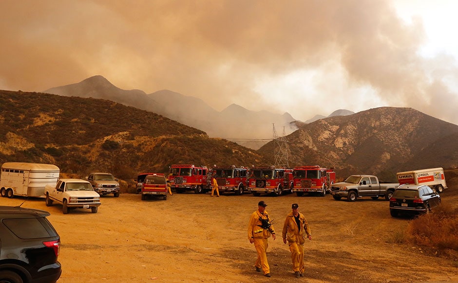 Fire trucks and horse trailers stage outside Wildlife Waystation in Santa Clarita. The wildfire burning in the mountainous Angeles National Forest north of Los Angeles has grown to more than 17 square miles. The Wildlife Waystation has about 400 animals on 160 acres within the national forest. AP Fire trucks and horse trailers stage outside Wildlife Waystation in Santa Clarita. The wildfire burning in the mountainous Angeles National Forest north of Los Angeles has grown to more than 17 square miles. The Wildlife Waystation has about 400 animals on 160 acres within the national forest. AP