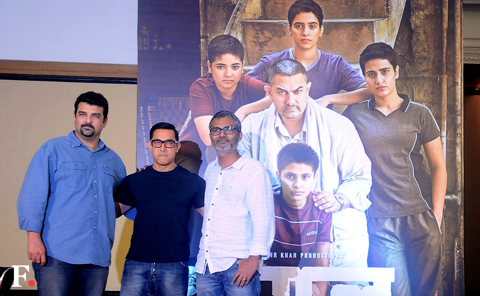 Aamir was accompanied by director Nitesh Tiwari and producers Disney India's Siddharth Roy Kapur at the poster launch. Image by Sachin Gokhale/Firstpost Aamir was accompanied by director Nitesh Tiwari and producers Disney India's Siddharth Roy Kapur at the poster launch. Image by Sachin Gokhale/Firstpost