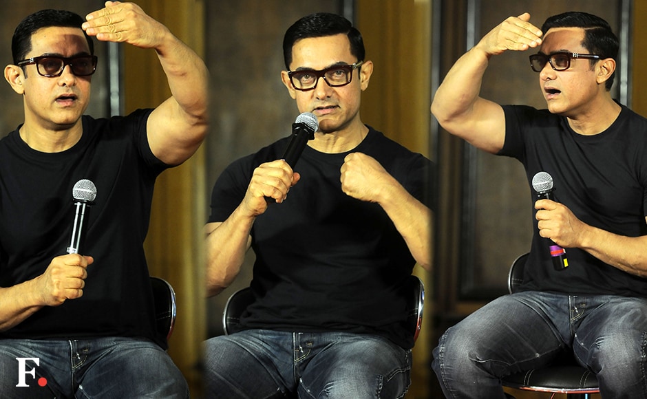 Amir Khan launched the poster of his film 'Dangal' at an event in Mumbai on Monday, 4 July 2016. Aamir plays Mahavir Singh Phogat in the movie, which traces how Phogat trained his daughters Geeta and Babita to become medal-winning wrestlers. Image by Sachin Gokhale/Firstpost Amir Khan launched the poster of his film 'Dangal' at an event in Mumbai on Monday, 4 July 2016. Aamir plays Mahavir Singh Phogat in the movie, which traces how Phogat trained his daughters Geeta and Babita to become medal-winning wrestlers. Image by Sachin Gokhale/Firstpost
