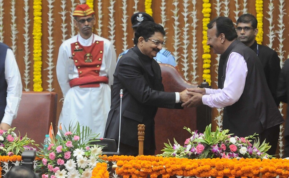 Governor Rao congratulates Madan Yerawar, BJP MLA from Yavatmal, who was inducted as minister of state. He began his political career in 1991 as a municipal councillor in Yavatmal and has occupied various positions at the grassroots level. Sachin Gokhale/Firstpost Governor Rao congratulates Madan Yerawar, BJP MLA from Yavatmal, who was inducted as minister of state. He began his political career in 1991 as a municipal councillor in Yavatmal and has occupied various positions at the grassroots level. Sachin Gokhale/Firstpost