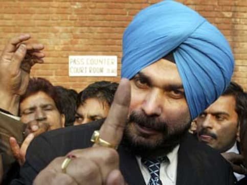Punjab chief minister Amarinder Singh says Navjot Singh Sidhu's act to hug Pakistan Army chief was 'wrong' Punjab chief minister Amarinder Singh says Navjot Singh Sidhu's act to hug Pakistan Army chief was 'wrong'