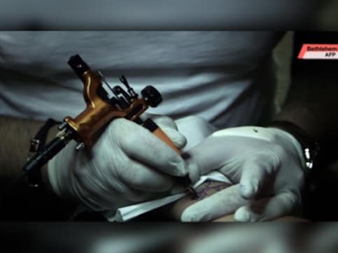 For this Bethlehem tattoo artist, religion is more than skin deep For this Bethlehem tattoo artist, religion is more than skin deep