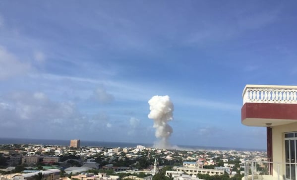 Suicide blasts at Somalia's Mogadishu airport: Death toll climbs to 10 Suicide blasts at Somalia's Mogadishu airport: Death toll climbs to 10