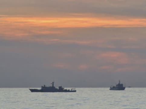 Beijing accuses US of 'stirring up trouble' after two American bombers fly close to South China Sea Beijing accuses US of 'stirring up trouble' after two American bombers fly close to South China Sea