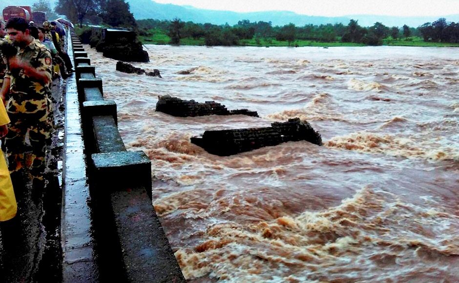Officials told media that flooding of the river Savitri could be the reason behind the collapse. However, NDRF DG also said that rescue operations will be hampered due to continuous rainfall. "Heavy rains are likely to hamper rescue operations. We hope conditions improve when our teams reach the collapse site," he said. PTI Officials told media that flooding of the river Savitri could be the reason behind the collapse. However, NDRF DG also said that rescue operations will be hampered due to continuous rainfall. "Heavy rains are likely to hamper rescue operations. We hope conditions improve when our teams reach the collapse site," he said. PTI