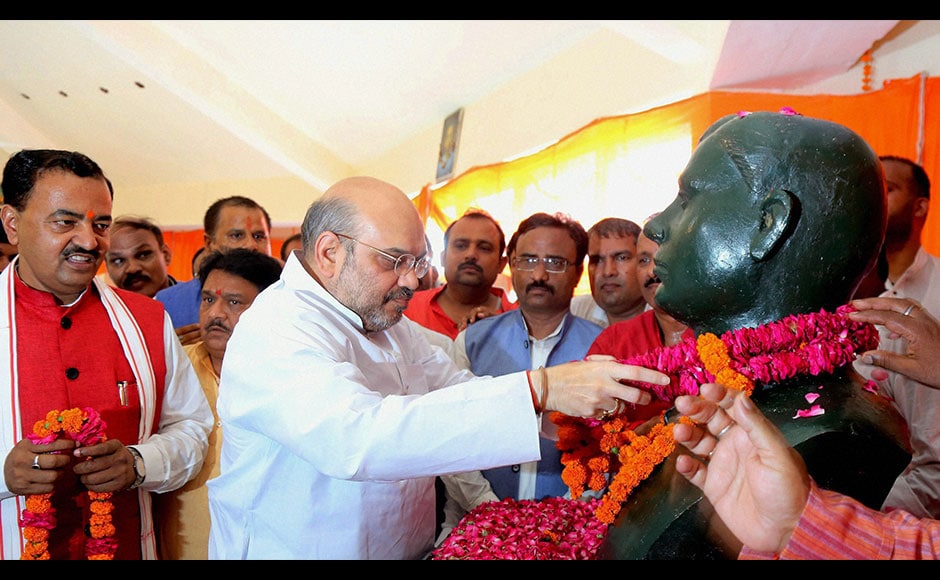BJP President Amit Shah (centre) pays floral tribute to the great revolutionaries of Kakori in Lucknow. Lashing out at Congress, Shah had claimed that the country has not witnessed any progress since Independence as only "one family" held the reins for 60 years. PTI BJP President Amit Shah (centre) pays floral tribute to the great revolutionaries of Kakori in Lucknow. Lashing out at Congress, Shah had claimed that the country has not witnessed any progress since Independence as only "one family" held the reins for 60 years. PTI