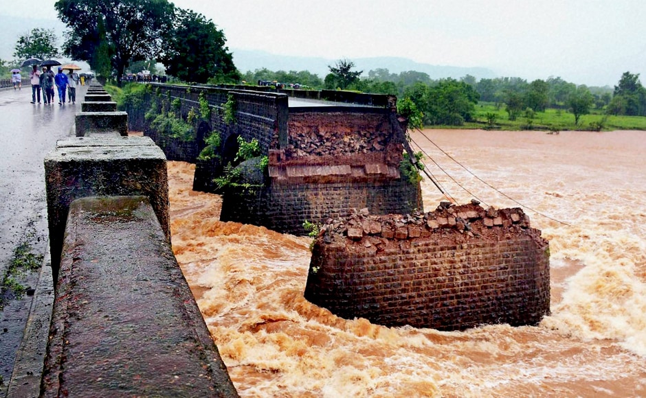Meanwhile, Maharashtra Chief Minister Devendra Fadnavis tweeted that the primary reason for the collapse seems to be "the high pressure caused due to flooding of river Savitri due to heavy rains in the catchment of Mahabaleshwar." PTI Meanwhile, Maharashtra Chief Minister Devendra Fadnavis tweeted that the primary reason for the collapse seems to be "the high pressure caused due to flooding of river Savitri due to heavy rains in the catchment of Mahabaleshwar." PTI