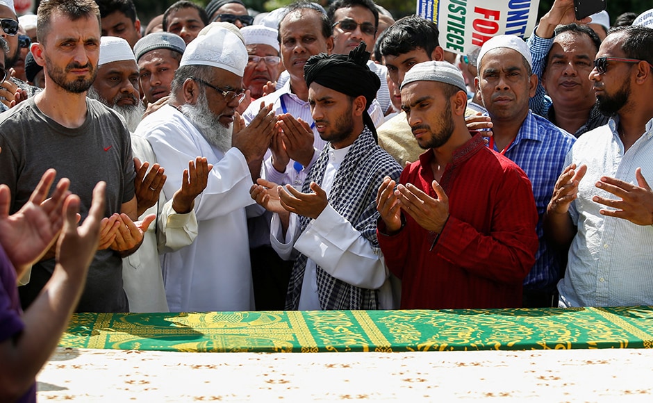 Community members pray next to the coffins of Imam Akonjee. Muslim representatives pointed to growing Islamophobia and anti-Muslim sentiment in the country in the light of attacks in the US and abroad as well as hostile statements by Republican presidential candidate Donald Trump. Reuters Community members pray next to the coffins of Imam Akonjee. Muslim representatives pointed to growing Islamophobia and anti-Muslim sentiment in the country in the light of attacks in the US and abroad as well as hostile statements by Republican presidential candidate Donald Trump. Reuters