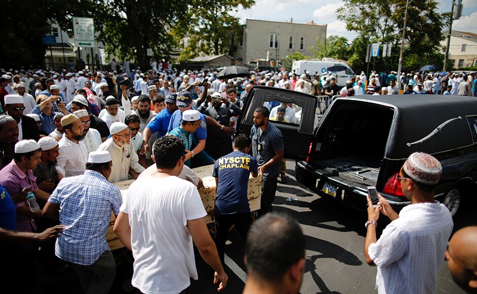 Community representatives move the coffin to the hearse as they gather for the funeral service of the Imam. The police charged Morel, 35, with two counts of second-degree murder. "There is nothing in the preliminary investigation to indicate that they were targeted because of their faith," police told journalists. Reuters Community representatives move the coffin to the hearse as they gather for the funeral service of the Imam. The police charged Morel, 35, with two counts of second-degree murder. "There is nothing in the preliminary investigation to indicate that they were targeted because of their faith," police told journalists. Reuters