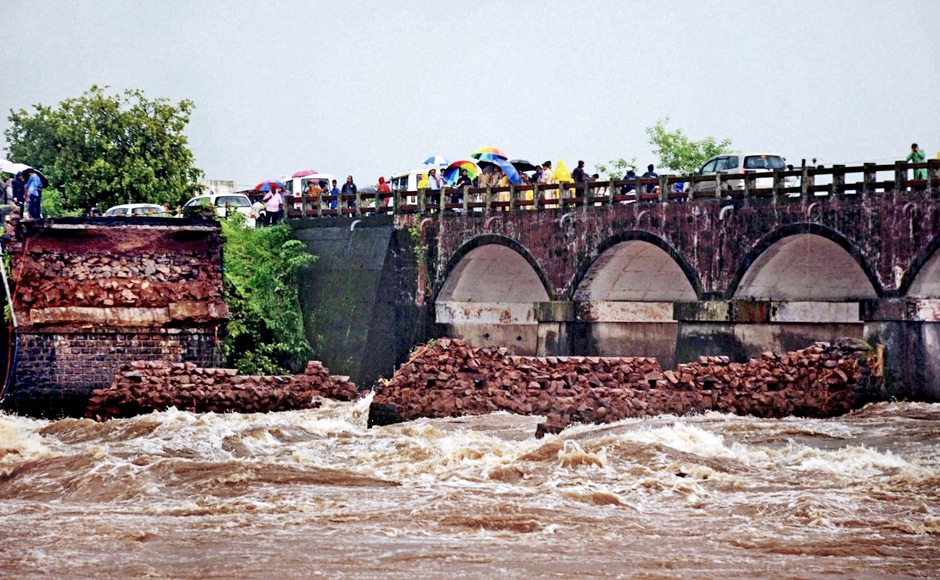 There are two parallel bridges on the river Savitri. The bridge which collapsed was constructed during the British era and could not withstand the tumultuous rain, news reports said. According to reports, traffic has been redirected from the spot. Officials are expecting fewer casualties and lesser damage since the collapse happened late in the night. PTI There are two parallel bridges on the river Savitri. The bridge which collapsed was constructed during the British era and could not withstand the tumultuous rain, news reports said. According to reports, traffic has been redirected from the spot. Officials are expecting fewer casualties and lesser damage since the collapse happened late in the night. PTI