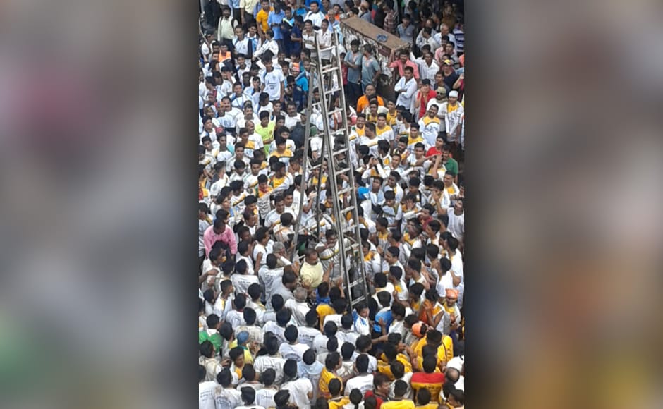 While one Dadar organisation built a 'horizontal' pyramid on the ground and then broke the pot at a height of more than 30 feet, but the Govinda climbed a ladder to break it. Sanjay Sawant While one Dadar organisation built a 'horizontal' pyramid on the ground and then broke the pot at a height of more than 30 feet, but the Govinda climbed a ladder to break it. Sanjay Sawant