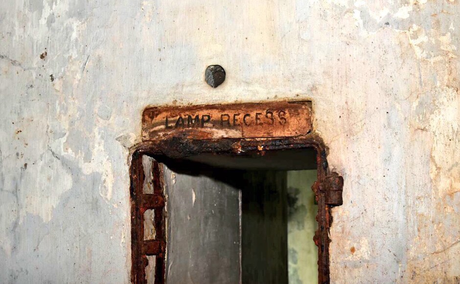 The bunker's rooms are named Shell Store, Gun Shell, Cartridge Store, Shell Lift, Pump and Workshop and there are scores of Lamp Recesses in the gangway. Image: CMO The bunker's rooms are named Shell Store, Gun Shell, Cartridge Store, Shell Lift, Pump and Workshop and there are scores of Lamp Recesses in the gangway. Image: CMO