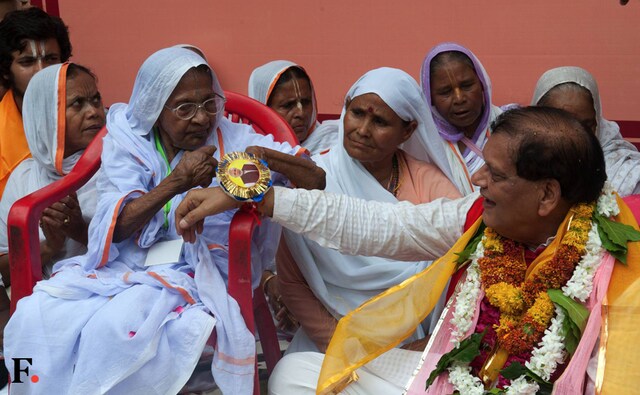 In a bold move to break the age-old traditions, hundreds of widows of Vrindavan and liberated manual scavenger women considered "untouchables" publicly tied Rakhi to 50 upper caste pundits and Sanskrit scholars at the century-old Gopinath Temple in Vrindavan on Wednesday. (Naresh Sharma/Firstpost) In a bold move to break the age-old traditions, hundreds of widows of Vrindavan and liberated manual scavenger women considered "untouchables" publicly tied Rakhi to 50 upper caste pundits and Sanskrit scholars at the century-old Gopinath Temple in Vrindavan on Wednesday. (Naresh Sharma/Firstpost)