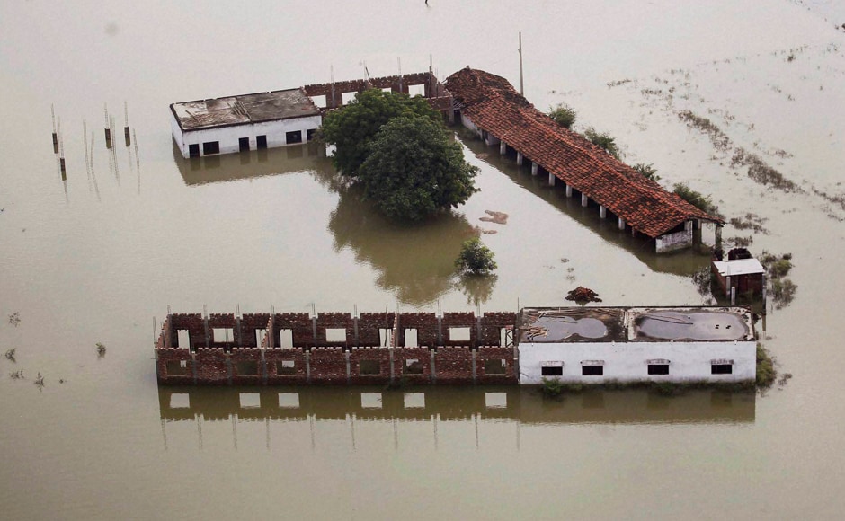 An aerial view of the floods which has wrecked havoc in daily lives of people with Ganga and Yamuna still hovering above the danger mark in Allahabad. An aerial view of the floods which has wrecked havoc in daily lives of people with Ganga and Yamuna still hovering above the danger mark in Allahabad.