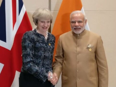 Modi meets UK's new PM Theresa May, holds discussion on enhancing bilateral ties Modi meets UK's new PM Theresa May, holds discussion on enhancing bilateral ties