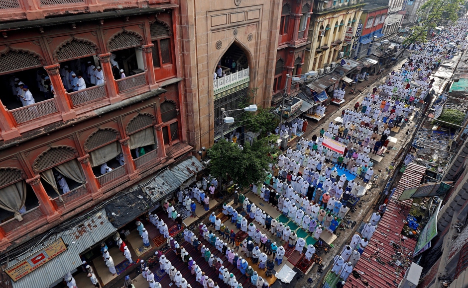 However, for the rest of India, Eid was celebrated with much fanfare. People offer Eid prayers on a street outside a mosque in Kolkata. (Photo: Reuters) However, for the rest of India, Eid was celebrated with much fanfare. People offer Eid prayers on a street outside a mosque in Kolkata. (Photo: Reuters)