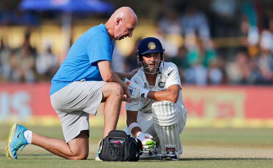A team physiotherapist attends to Gautam Gambhir as the latter aggravated his shoulder injury after diving while coming back for a second run. He retired hurt for 6. AP A team physiotherapist attends to Gautam Gambhir as the latter aggravated his shoulder injury after diving while coming back for a second run. He retired hurt for 6. AP