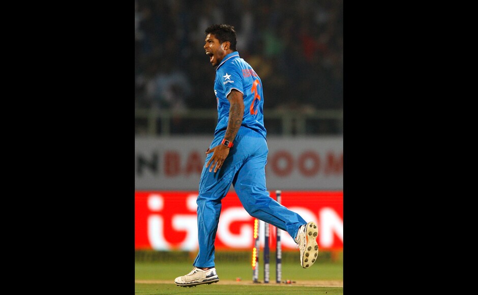 India's Umesh Yadav celebrates after taking the wicket of New Zealand's Martin Guptill. AP India's Umesh Yadav celebrates after taking the wicket of New Zealand's Martin Guptill. AP
