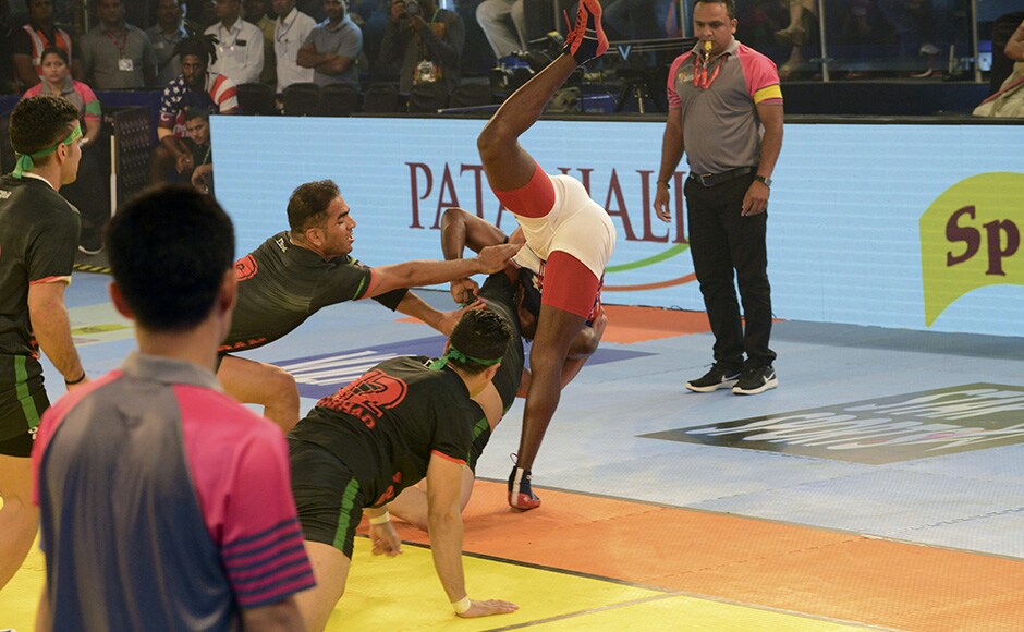 Kabaddi team members of Iran and US struggle during 2016 Kabaddi World Cup. AFP Kabaddi team members of Iran and US struggle during 2016 Kabaddi World Cup. AFP