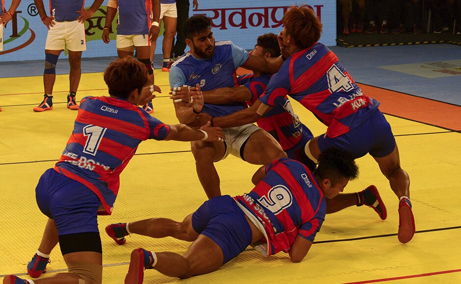 South Korean kabaddi players pounce on an Indian opponent during the 2016 Kabaddi World Cup in Ahmedabad. AFP South Korean kabaddi players pounce on an Indian opponent during the 2016 Kabaddi World Cup in Ahmedabad. AFP