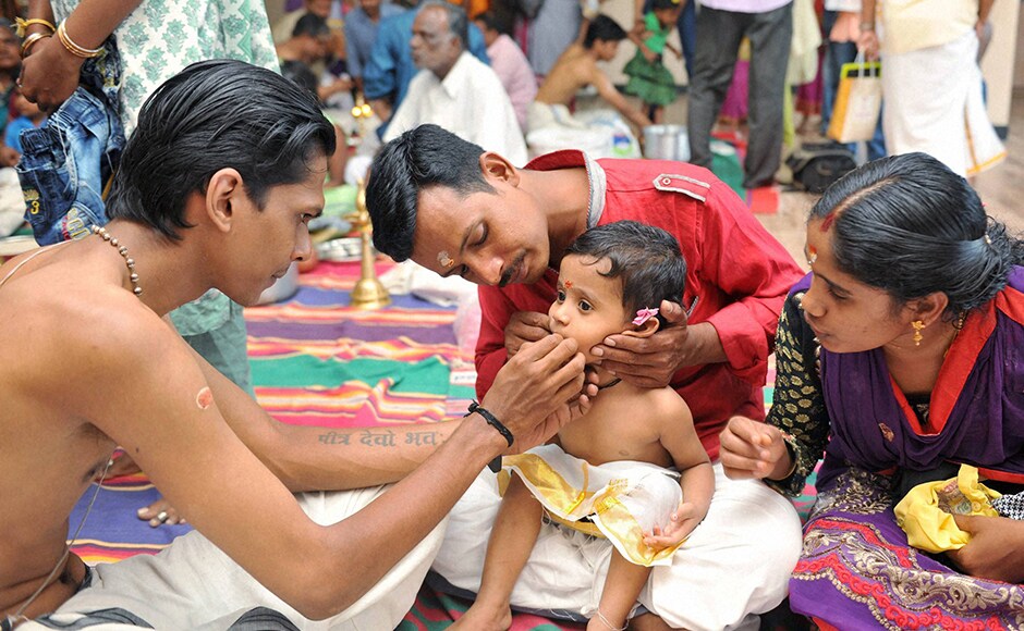 Meanwhile, Vijayadasami is being celebrated across the country. A priest performs Vidhyarambam rituals on the Occasion of Vijayadasami festival at Ayyappan Temple in Coimbatore on Tuesday. (Photo: PTI) Meanwhile, Vijayadasami is being celebrated across the country. A priest performs Vidhyarambam rituals on the Occasion of Vijayadasami festival at Ayyappan Temple in Coimbatore on Tuesday. (Photo: PTI)