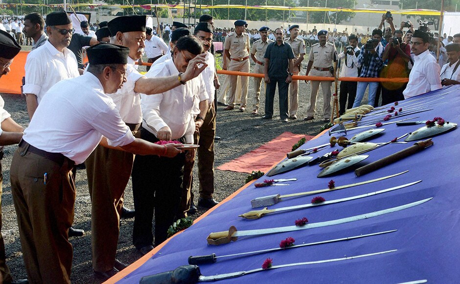 RSS chief Mohan Bhagwat, dressed in new uniform, performs shastra-pujan on the occasion of foundation day and Vijaya Dashami in Nagpur on Tuesday. PTI RSS chief Mohan Bhagwat, dressed in new uniform, performs shastra-pujan on the occasion of foundation day and Vijaya Dashami in Nagpur on Tuesday. PTI