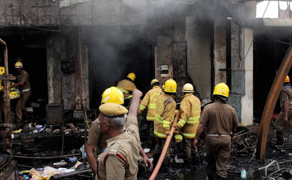 Firefighters from Sivakasi, Srivilliputhur, Virudhunagar and Sattur were rushed to control the raging flames. PTI Firefighters from Sivakasi, Srivilliputhur, Virudhunagar and Sattur were rushed to control the raging flames. PTI