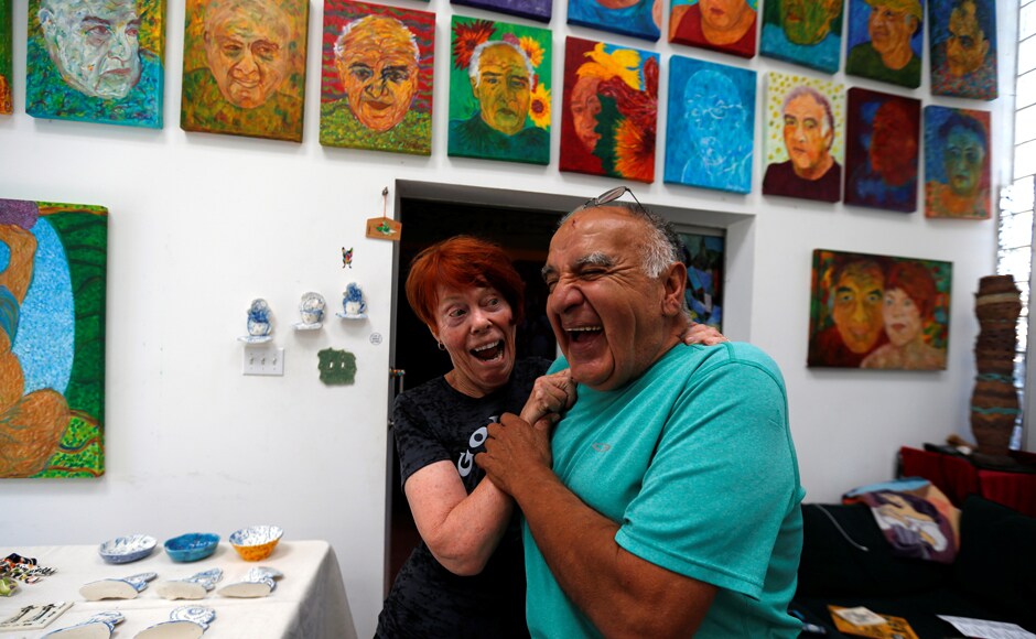 Artists Gonzalo Duran and his wife Cheri Pann laugh in the studio of their Mosaic Tile House. Image from Reuters Artists Gonzalo Duran and his wife Cheri Pann laugh in the studio of their Mosaic Tile House. Image from Reuters