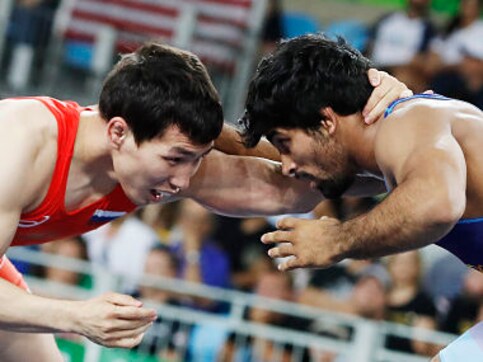 Wrestlers Sandeep Tomar, Ritu Phogat bag gold medals in Commonwealth championships Wrestlers Sandeep Tomar, Ritu Phogat bag gold medals in Commonwealth championships
