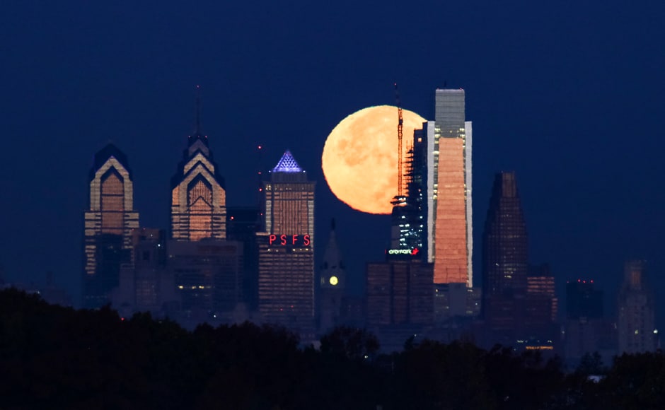 The supermoon sets behind the Philadelphia skyline on Monday. The brightest moon in almost 69 years lights up the sky this week in a treat for star watchers around the globe. The phenomenon is known as the supermoon. AP The supermoon sets behind the Philadelphia skyline on Monday. The brightest moon in almost 69 years lights up the sky this week in a treat for star watchers around the globe. The phenomenon is known as the supermoon. AP