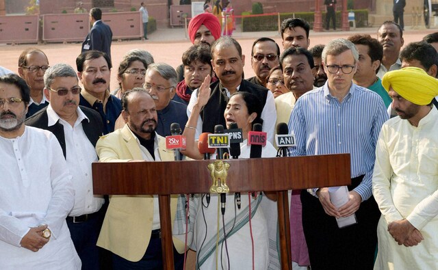 "The newly launched demonetisation scheme is a financial calamity. Government should restore normalcy as there is no vegetable, milk in the market. It's a big black scheme," the West Bengal chief minister said while addressing media after meeting President Pranab Mukherjee. PTI "The newly launched demonetisation scheme is a financial calamity. Government should restore normalcy as there is no vegetable, milk in the market. It's a big black scheme," the West Bengal chief minister said while addressing media after meeting President Pranab Mukherjee. PTI